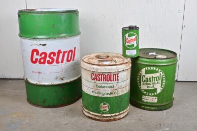 CASTROL: Four large Castrol oil drums and tins of various ages and sizes