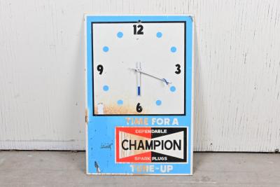 CHAMPION: A 1970s Champion Spark Plugs battery wall clock