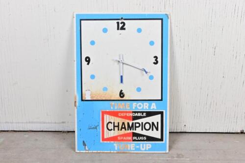 CHAMPION: A 1970s Champion Spark Plugs battery wall clock