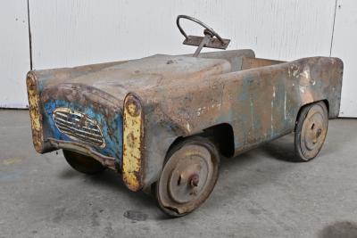 TOY PEDAL CAR: A circa 1950s rustic toy pedal car