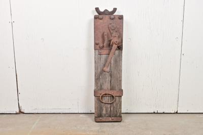 STAGECOACH: A 19th Century timber and cast iron jack (84cm high)