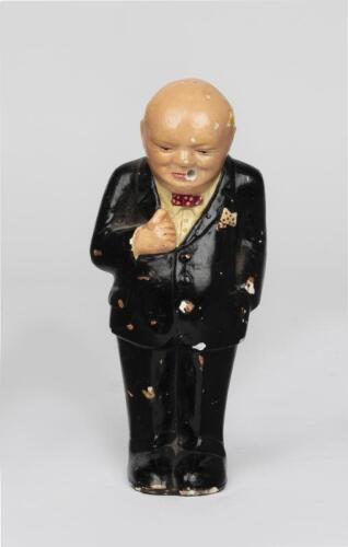 WINSTON CHURCHILL: A painted plaster cast figure of Winston Churchill (17cm high)