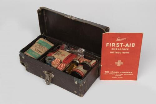 FIRST AID KIT: A Sanax first aid kit, mid 20th century