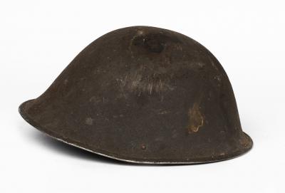 HELMET: A WWII British MKIII "Turtle" steel helmet, circa 1944