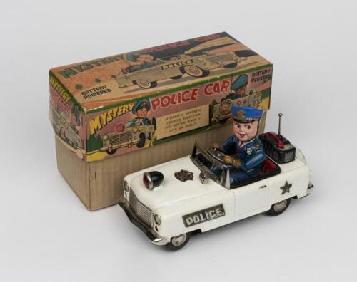 JEEP: A 1960s Japanese battery operated tin toy of a Police Jeep by T.N. Nomura
