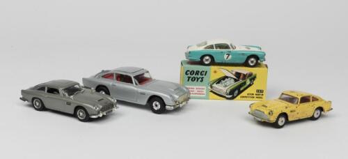 ASTON MARTIN: A collection of three Corgi die-cast toy cars and another 1960s and later