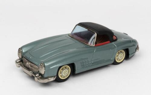 MERCEDES: A 1960s Japanese battery operated tin toy of a Mercedes Benz 300 SL 2-Door Roadster by Bandai