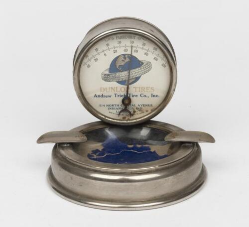 DUNLOP: A novelty ashtray mounted with a Dunlop Tires thermometer, circa 1940/50s