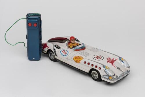 RACE CAR: A 1950s Japanese R/C battery operated tin toy of a race car by Aoshin