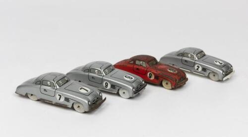MERCEDES: Four tin toys of a Mercedes Benz Gullwing 300 SL 2-door coupes