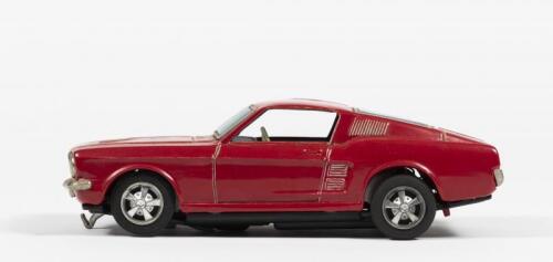 MUSTANG: A circa 1960's battery operated tinplate Ford Mustang by Taiyo (25cm long)