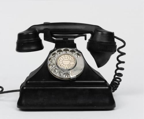TELEPHONES: A General Electric black Bakelite "Pyramid" rotary telephone, late 1930's