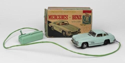 MERCEDES: A 1950s Japanese R/C battery operated tin toy of a Mercedes Benz Gullwing 300 SL 2-door coupe by Bandai