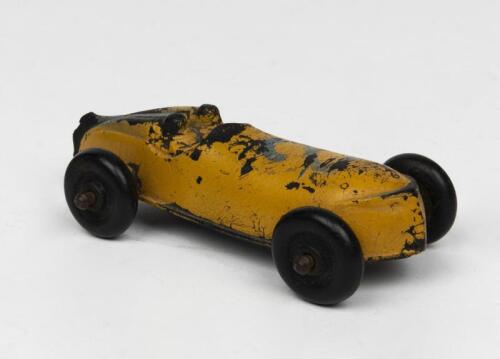 LAND SPEED: A 1930s painted rubber toy race car by The Sun Rubber Company