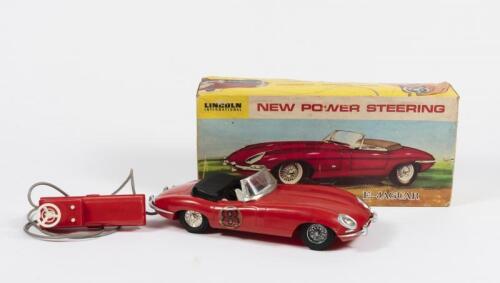 JAGUAR: An original plastic 'E' Type Jaguar remote controlled car by Lincoln International (Hong Kong). Measures 30 cm in length