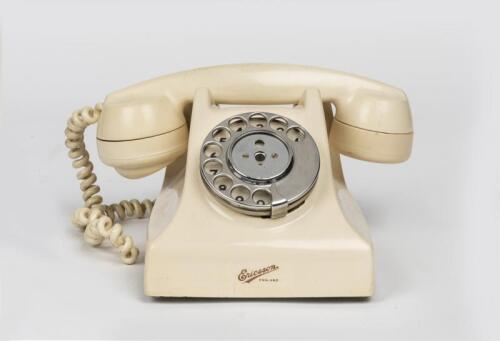 TELEPHONES: An Ericcson ivory Bakelite rotary telephone, circa 1950