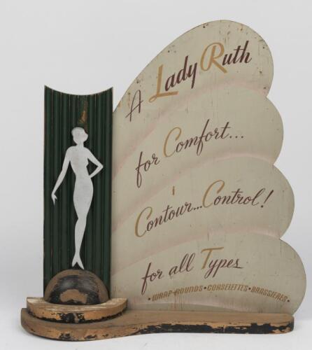 SHOP DISPLAY: An Art Deco point of sale display sign "Lady Ruth Contour Control Corset", circa 1930