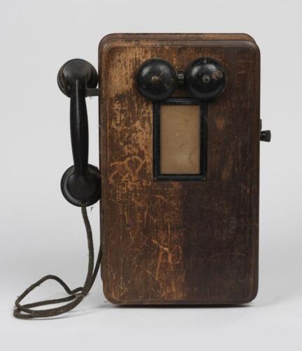 TELEPHONES: A British Ericsson magneto oak case telephone, circa 1930 and later