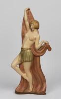 STATUETTE: An Art Deco style plaster cast figure of a dancer, 20th century