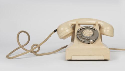 TELEPHONES: An Ericsson ivory Bakelite rotary telephone, late 1950's