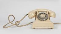 TELEPHONES: An Ericsson ivory Bakelite rotary telephone, late 1950's