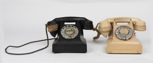 TELEPHONES: Two Ericcson black Bakelite rotary telephones, circa 1950