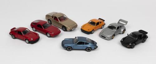PORSCHE: A collection of seven mostly 1:43 scale die-cast model toys of Porsches