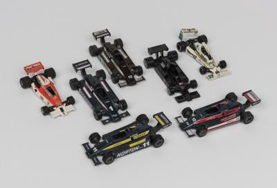 GRAND PRIX/INDY 500: A collection of eight 1:41 scale die-cast model toys of Grand Prix and Indy 500 racing cars from the 1970/80s