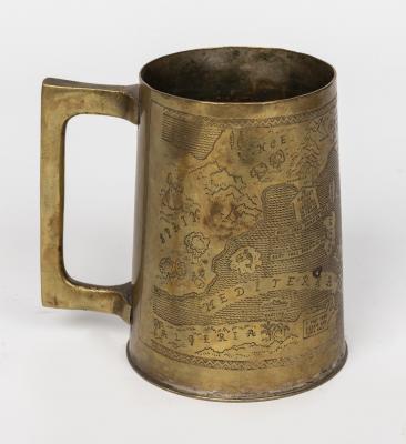 TRENCH ART: A tankard decorated with a map of the Mediterranean showing noteworthy battle