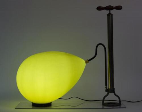 DECORATIVE LAMP: A decorative lamp in the form of an Edwardian hand pump and inflatable style plastic balloon