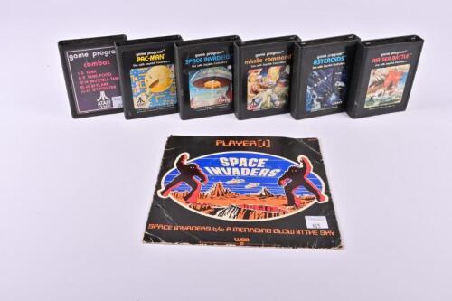 ATARI: A collection of six Atari 2600 game cartridges&nbsp;including Space Invaders and Pacman together with a space invaders EP