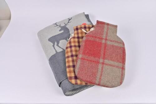 WARMERS: A woolen blacket by David Fussenegger, Australia<br />together with two hot water bottles and fabric covers by Anne Mannion of Blackthorn Textiles, Yea Victoria