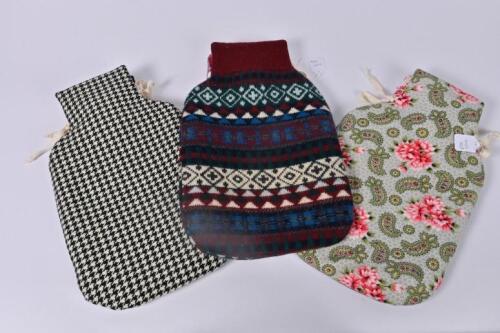HOT WATER BOTTLES: Three hot water bottles and upcycled covers by Anne Mannion of Blackthorn Textile Designs, Yea Victoria