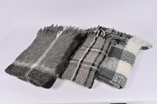 BLANKETS: A 100% Alpaca Pile throw blanket and two chequered grey wool throw blankets