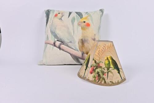 L'ECHOPPE: A budgerigar decorated lampshade and cockatoo decorated cushion