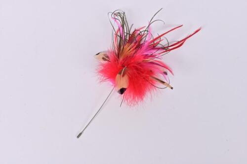 HAT PIN: A feathered hat pin, 26cm long approx