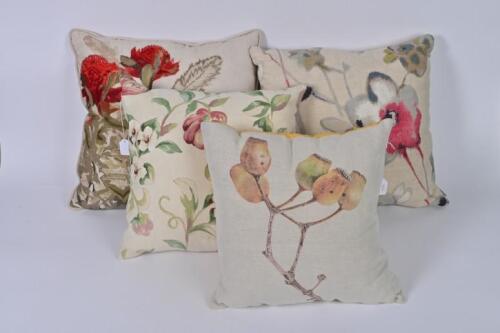 CUSHIONS: Four floral decorated cushions, the largest 50 x 49cm