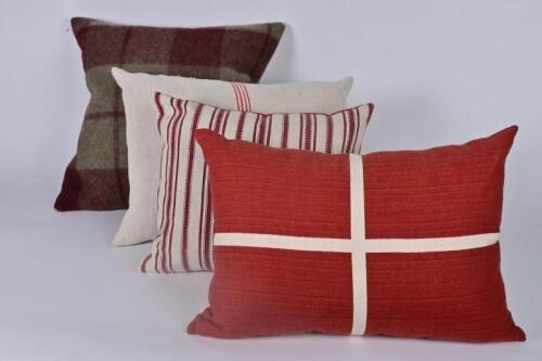 CUSHIONS: Four cushions made from repurposed blankets by Ann Mannion of Blackthorn textiles,&nbsp;including one WWII era with embroidered "AUSTRALIA" badge,&nbsp;the largest 46 x 50cm