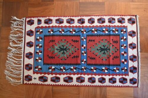 RUGS: A handwoven native American wool rug, West Coast, USA<br />172 x 105cm