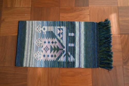 TAPESTRY: A wall hanging tapestry of native American design<br />102 x 59.5cm