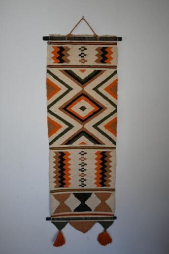 TAPESTRY: A wall hanging tapestry of native American design, 140 x 48cm