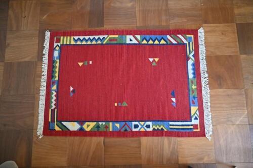 RUGS: Two&nbsp;handwoven Aztec style rugs with a geometric borders,&nbsp;176 x 123cm