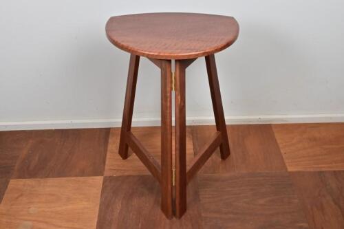 A pair of collapsible jarrah stools by Peter Sans, late 20th century, 66cm high, 45cm wide