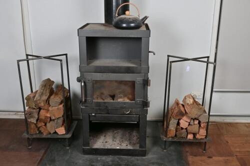FIREWOOD RACKS: A pair of fireside firewood storage racks, 77cm high, 41cm wide, 31cm deep *(see note)