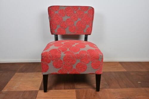CHAIR: A contemporary side chair with cotton red discs on grey ground upholstery *(see note)