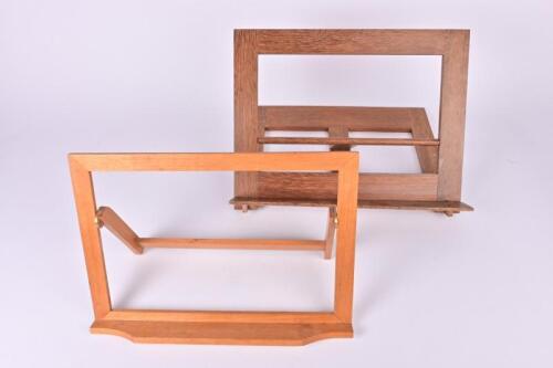 PETER SANS: Two wooden book stands, the largest 30cm high, 38cm wide