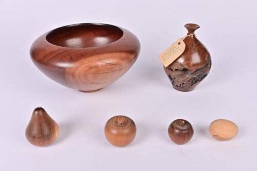 WOOD TURNING: A collection of vintage Australian timber turnings , comprising a jarrah bowl, a burl mallee wood vase, two Tasmanian blackwood apples, a Tasmanian blackwood pear and an egg, the bowl 11cm high, 20cm diameter