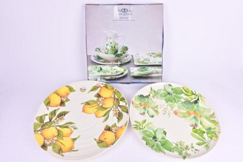 PLATTERS: Two fruit and floral decorated ceramic platters, one boxed , the largest 39cm diameter