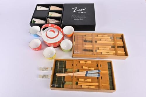 JAPANESE TEA AND DINNERWARE: A collection teaware and dinnerware including a teapot, tea cups and chopsticks