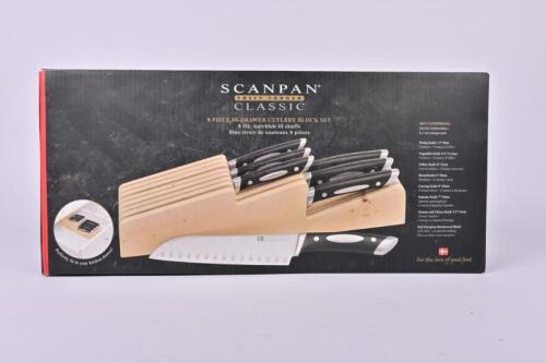 KITCHEN KNIVES: A eight piece Scanpan knife set and block